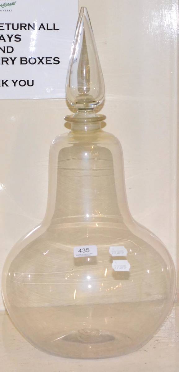 Lot 435 A large glass carboy and stopper