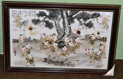 Lot 436 - A Chinese porcelain panel in a hardwood frame