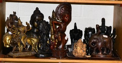 Lot 446 - A large group of figures and carvings including Indian bronze busts and figures of Buddha,...