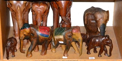 Lot 448 - Nine carved wooden elephants of various sizes (9)