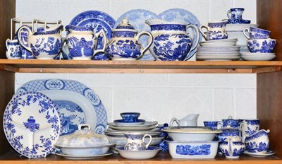 Lot 449 - A large quantity of 19th century and later Old Willow and other blue and white wares (on two...