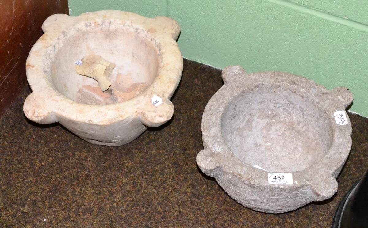 Lot 452 - A large marble mortar and a composite mortar, diameter 33cm and 31cm respectively