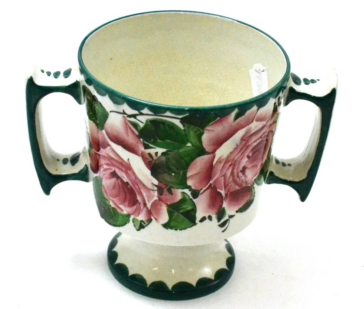 Lot 468 - Wemyss pedestal twin-handled loving cup, cabbage rose pattern