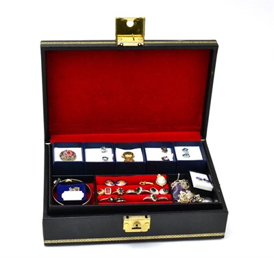 Lot 484 - A quantity of costume jewellery in a black two tier case