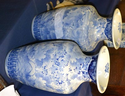 Lot 492 - A pair of Oriental blue and white baluster vases (a.f.)