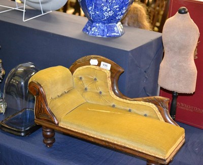 Lot 496 - A doll's velvet upholstered chaise longue, a small glass dome on stand and a miniature...