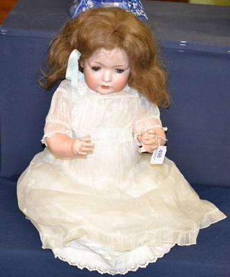 Lot 498 - A German Bruno Schmidt bisque socket head doll, impressed '2097' '5.5', with original brown...