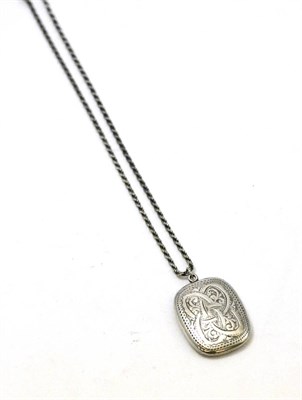 Lot 536 - A silver locket on chain of Celtic design, in box