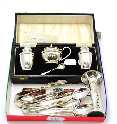 Lot 537 - A cased silver three piece cruet set, a silver bud vase, a set of twelve teaspoons and two sets...