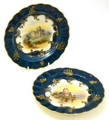 Lot 550 - Pair of Royal Worcester plates, hand decorated with views of Ross Castle and Brougham Castle,...