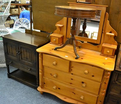 Lot 1008 - Reproduction oak linen fold two door cabinet, a reproduction circular drum wine table and a...