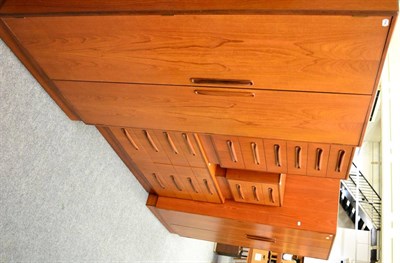 Lot 1020 - Five piece teak G-plan bedroom suite comprising of two wardrobes, bedside chest, tall boy and...