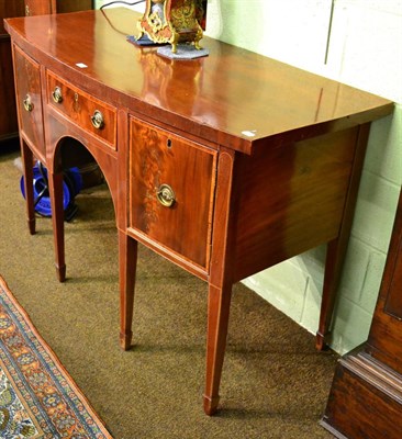 Lot 1158 - George III mahogany inlaid bowfront sideboard