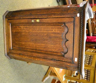 Lot 1201 - An 18th century oak hanging corner cupboard