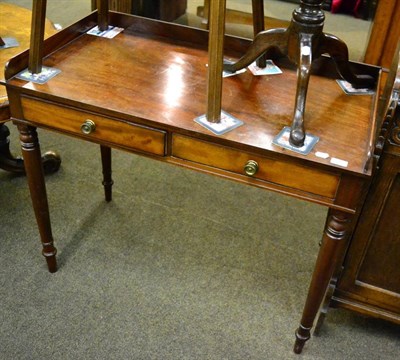 Lot 1207 - A mahogany writing table