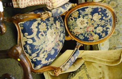 Lot 1224 - Victorian open armchair, later re-covered in floral fabric