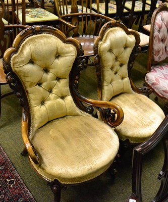 Lot 1231 - A set of five dining chairs with padded back supports, raised on stop-fluted legs, together with an