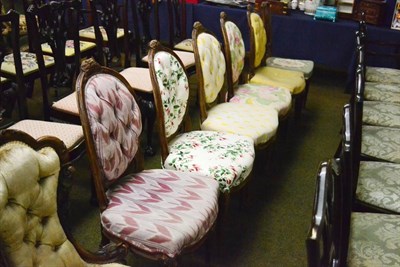 Lot 1232 - A late Victorian walnut framed armchair and a similar nursing chair