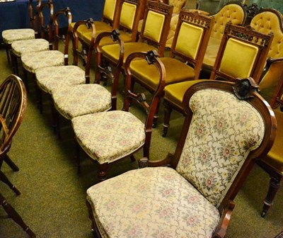 Lot 1241 - Set of six late Victorian rosewood dining chairs and a similar armchair upholstered to match