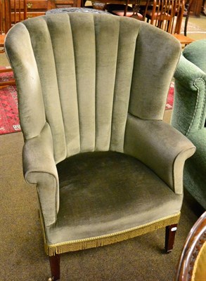 Lot 1244 - A George III style wingback chair (a.f.)