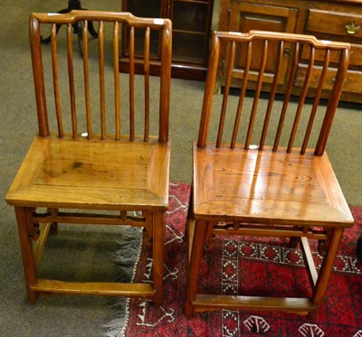 Lot 1246 - A pair of Chinese elm Shanghai chairs