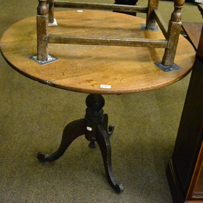 Lot 1249 - A 19th century oak circular pedestal table