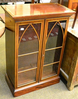 Lot 1250 - An Edwardian two door glazed bookcase