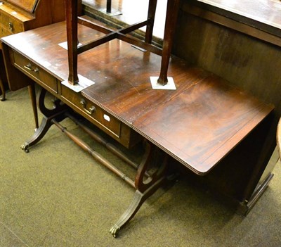 Lot 1259 - A reproduction mahogany sofa table