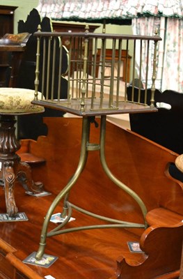 Lot 1268 - Walnut and brass revolving bookstand