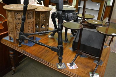 Lot 1269 - Two Indian folding occasional tables with circular tops, black painted coal hod with brass...