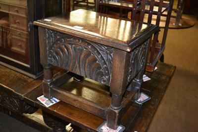 Lot 1275 - An oak box stool with hinged lid