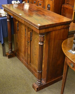 Lot 1292 - A mahogany William IV two door side cabinet