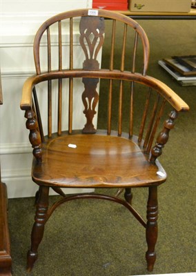 Lot 1305 - A 19th century Windsor armchair with crinoline stretcher