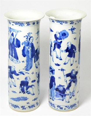 Lot 42 - A matched pair of Chinese blue and white cylindrical vases decorated with figures (a.f.)