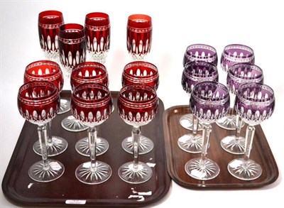 Lot 45 - Twelve Waterford crystal Clarendon pattern hock glasses (six ruby, six amethyst) together with four