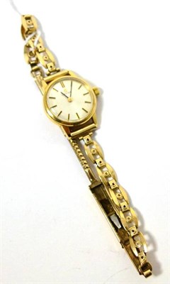 Lot 70 - A lady's gold plated wristwatch signed Omega, on attached later 9ct gold bracelet