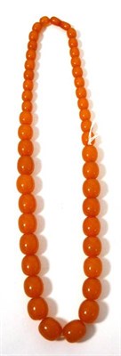 Lot 71 - A string of pressed amber beads