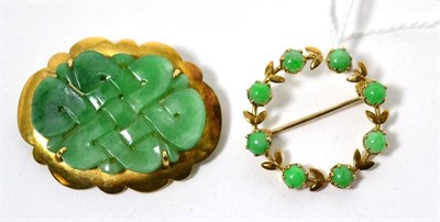 Lot 91 - Two jade type mounted brooches (2)