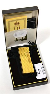 Lot 95 - A cased Dunhill lighter with certificate
