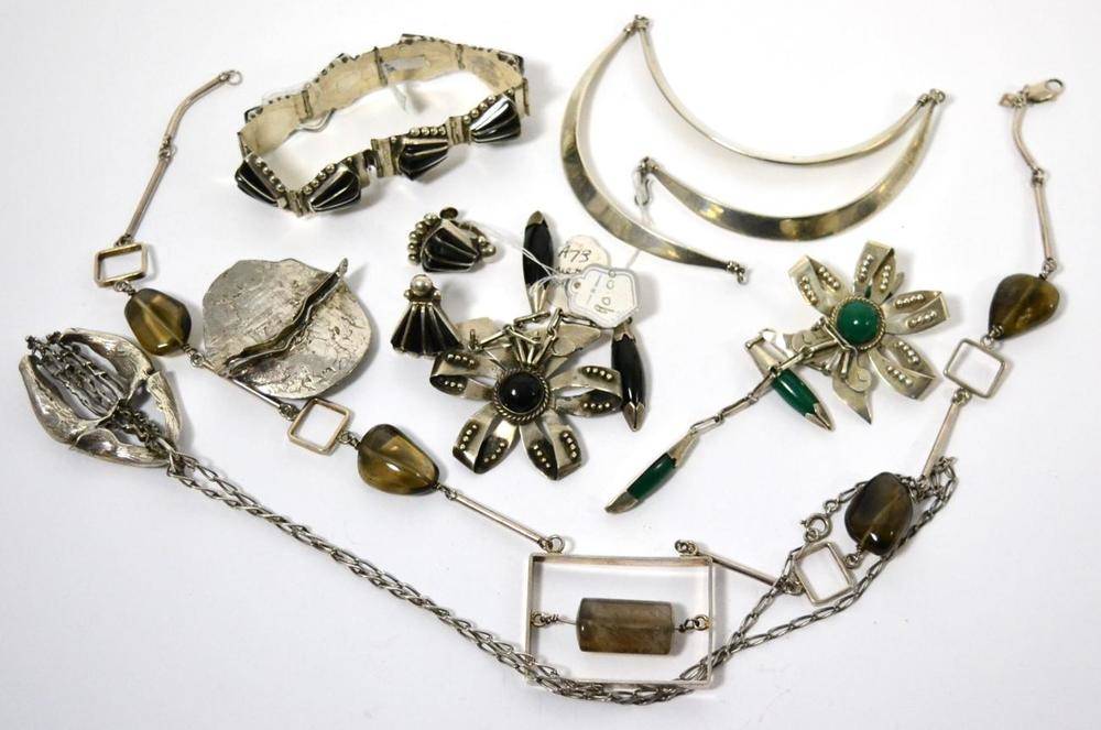 Lot 97 - Two Mexican white metal necklaces, pair of earrings, two floral brooches and a bracelet...