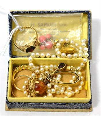 Lot 109 - A small group of jewellery including two 9ct gold stone set rings, heart locket stamped '15CT',...