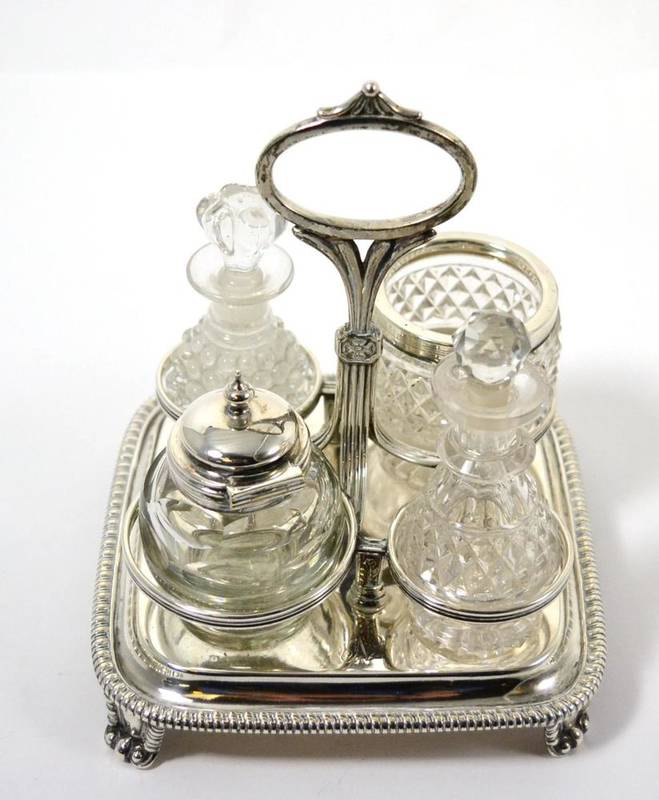 Lot 112 - A silver framed four piece condiment, Birmingham 1812/19, makers mark MB