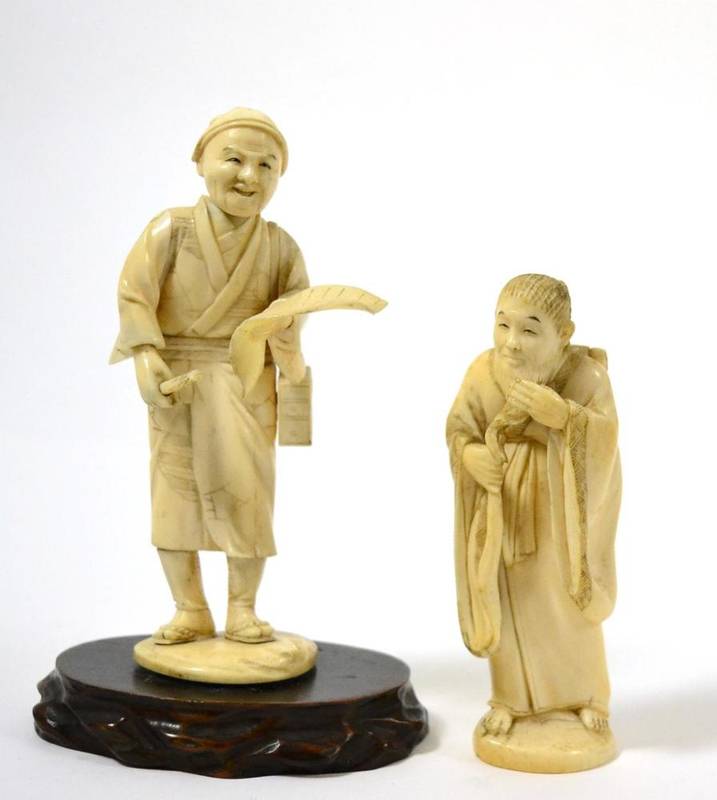 Lot 118 - A late 19th/early 20th century Japanese ivory bearded figure, 12cm; and an early 20th century...