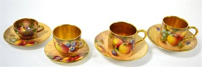Lot 121 - Four Royal Worcester fruit painted cups and saucers