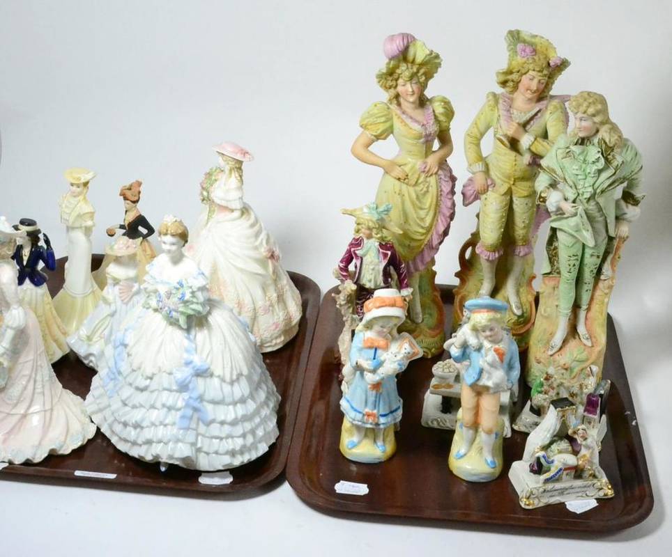 Lot 171 - A quantity of Coalport figures, Fairings bisque figures, etc (on two trays and one box)