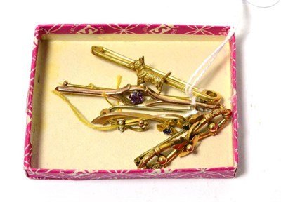 Lot 210 - A Terrier brooch stamped '15C', a 9ct gold brooch and two stone set brooches