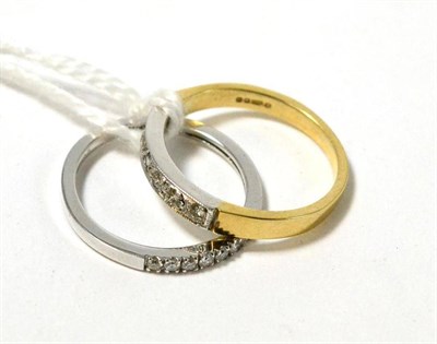 Lot 211 - Two 9ct gold diamond half hoop rings