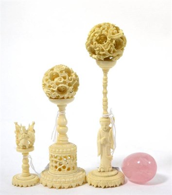 Lot 240 - An early 20th century Cantonese ivory puzzle ball and stand, 18cm; and an early 20th century...