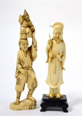 Lot 243 - A Japanese ivory okimono, the man holding a monkey on his head, signed, 20.5cm; and a Chinese ivory