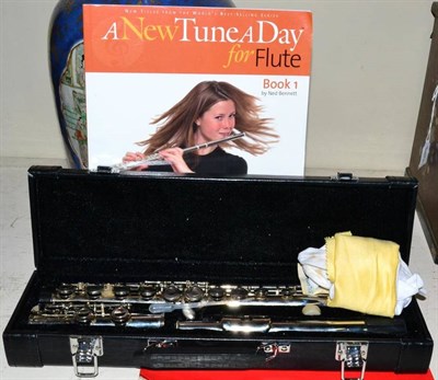 Lot 259 - A Ventiana cased flute and book etc